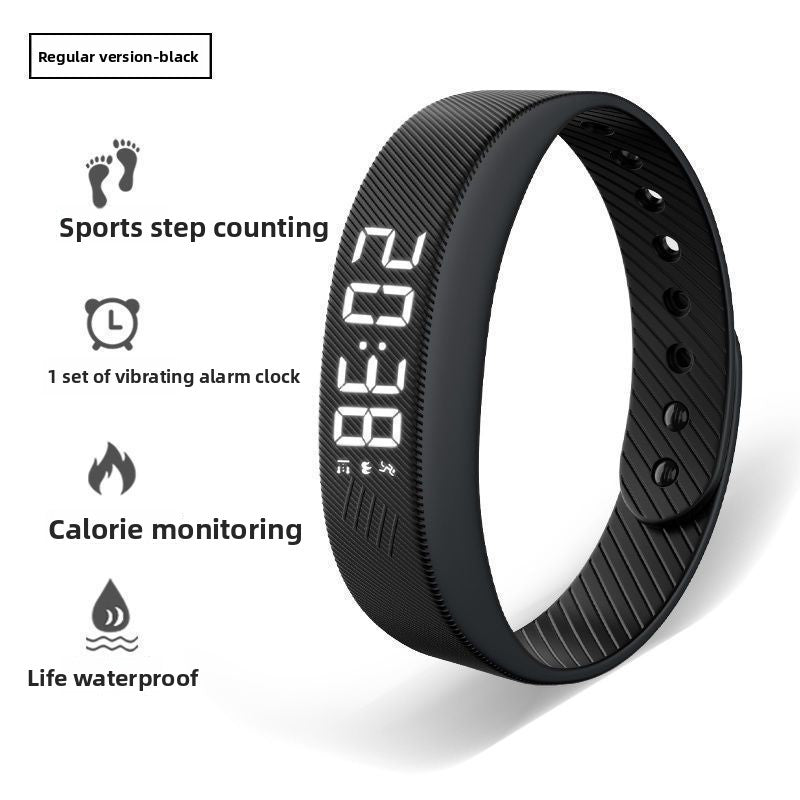 Black fitness tracker and vibration alarm with digital display 