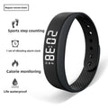 Black fitness tracker and vibration alarm with digital display 